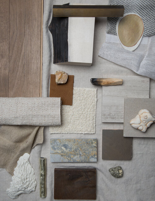 Interior materials and finishes arranged as a neutral mood board